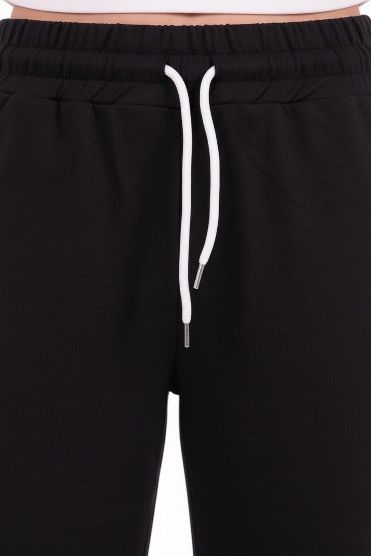 Kadın Paça Fiyonk Detay Arabiyeli Eşofman  Siyah